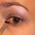 Dust the lower lashes