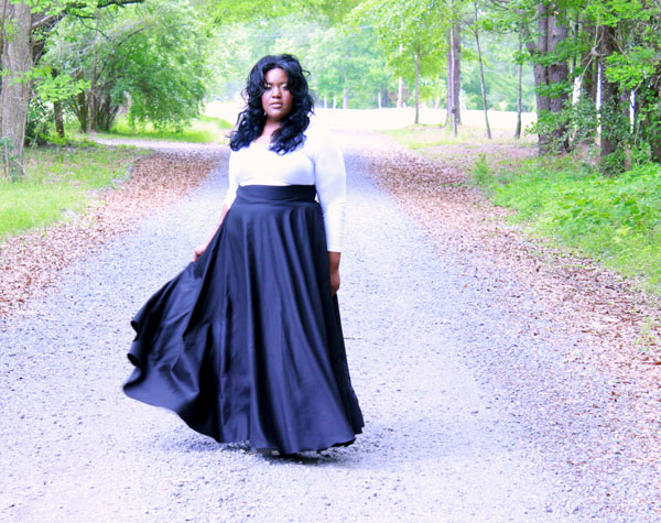 This high waist full wrap maxi skirt was designed by S. Benson.